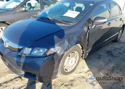 2009 Honda Civic Hybrid from USA, damaged, VIN JHMFA36299S015940